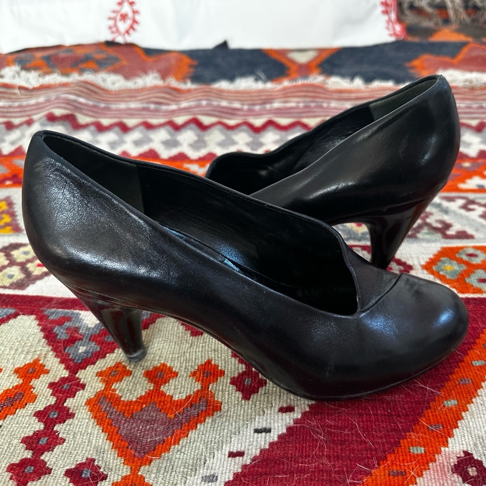 Gently worn Robert Clergerie heels with one scuff on sole.